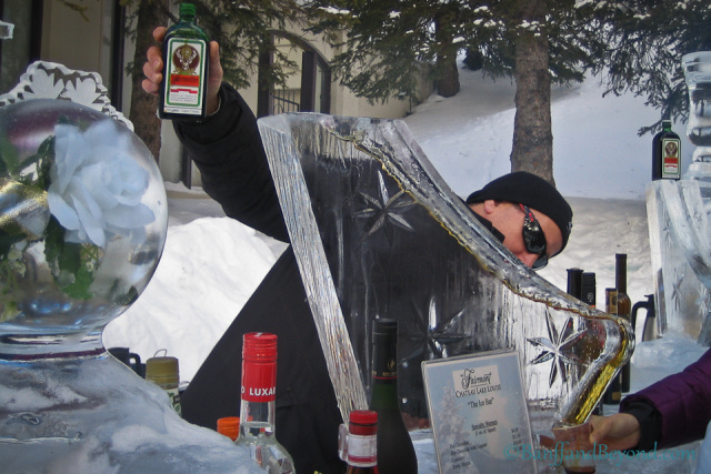 bartender-pouring-jagermeister-down-an-ice-sculpture-into-a-glass-at-the-lake-louise-ice-bar.jpg